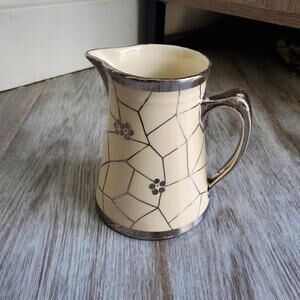 Cream and Silver Ceramic Pitcher